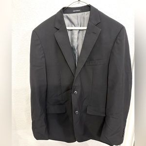 Wilke Rodriguez suit jacket modern fit.  No size tag refer to measurements.